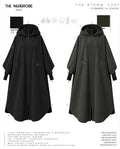 THE STORM COAT — Manteau technique oversize à capuche et mitaines